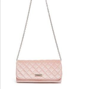 bella clutch wallet color is blush velvet